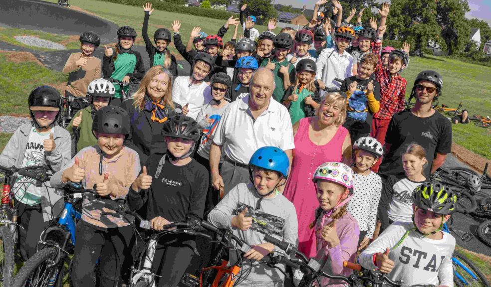 Group of people from Willand community with ex BMX world champion