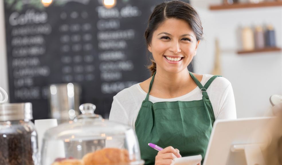 Person at counter in cafe