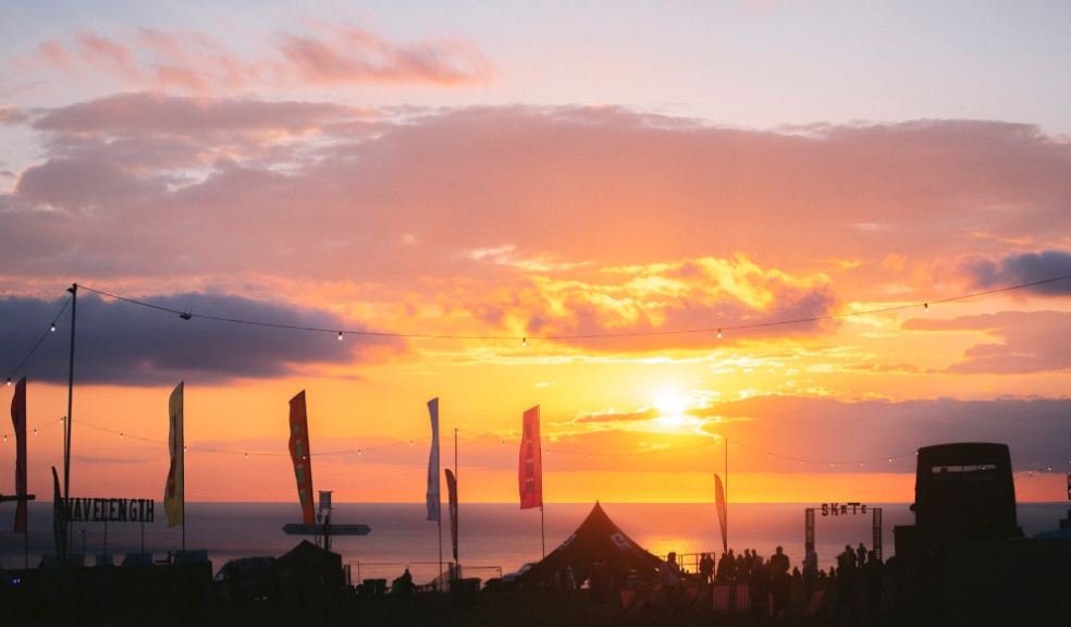 Beautiful sunset of orange and yellow colours over the beach