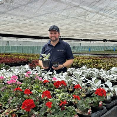 Potting up  eco-pots at Otter Garden Centre in Ottery