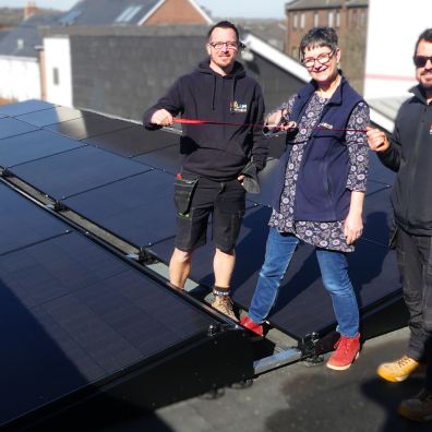 Cutting the ribbon on a new solar PV installation 