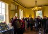 People browsing stands at a craft fair at Escot House